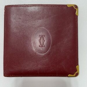 Authentic Cartier Men’s Burgundy Leather Bi-Fold Wallet with Gold Corner Trim